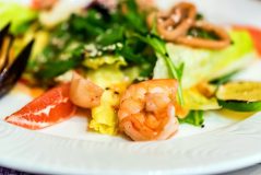 Seafood salad on plate close